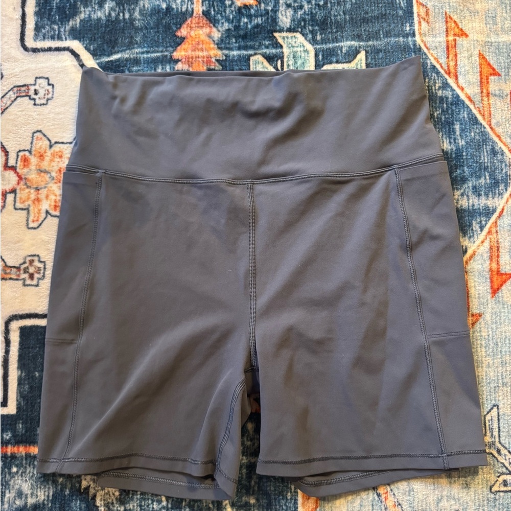 Vuori Women's High-Waisted Blue Bike Shorts